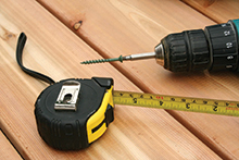 Tape measure and drill Tape measure and drill