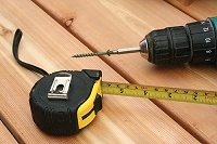 Tape measure and drill