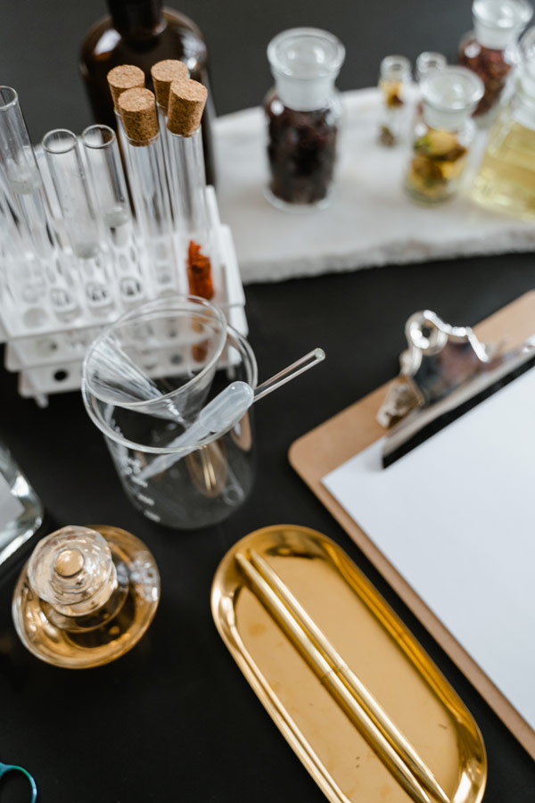 glass vials and clipboard