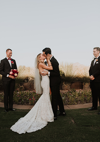 Kristen Henneke Photography - Bride and Groom';s first kiss at sunset, outrdoors