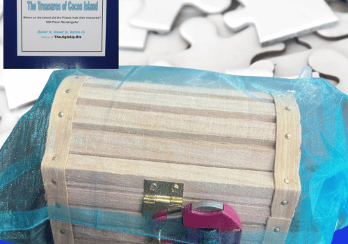 Wooden treasure chest over baby blue silk with signage