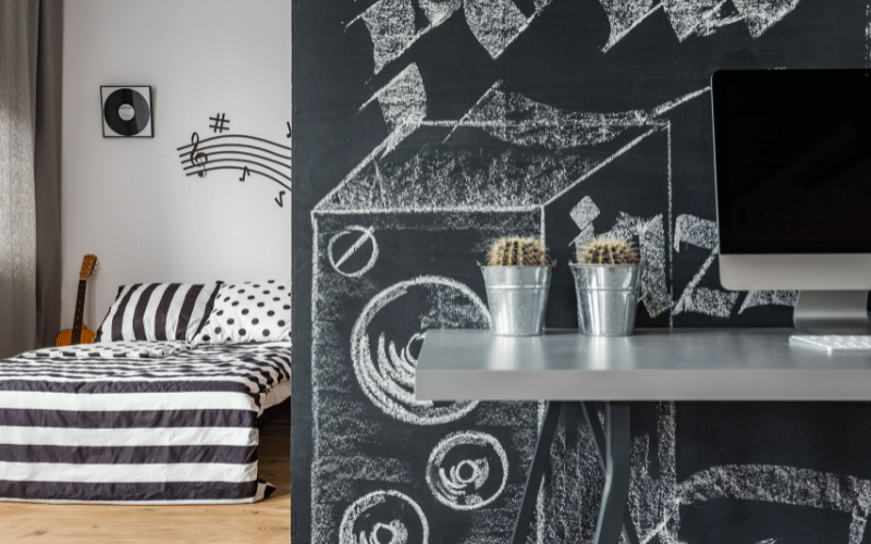 Home wall chalkboard with design on it 