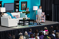 stage-200 Speaker on stage with an audience