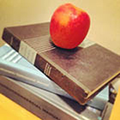 Apple_175 Pile of books with an apple on top.