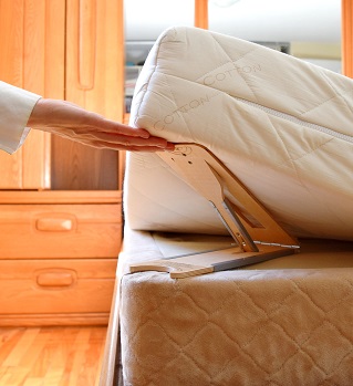 The BedMaker with hand tall - small.jpg
