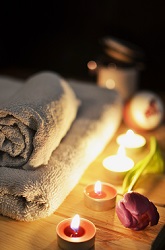Canva - Four Lit Tealights Canva - Four Lit Tealights
